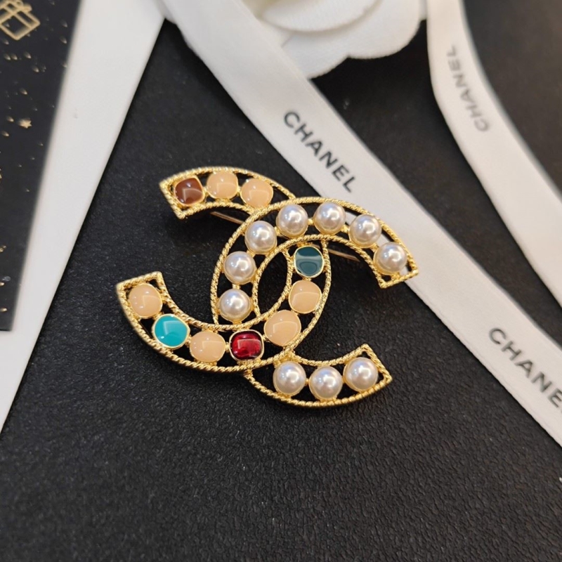 Ch**el brooches